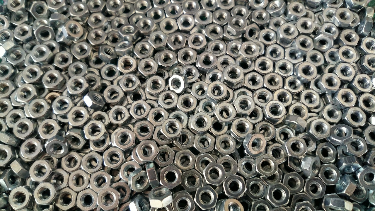 nickel vs chrome plating - pile of metal hex nuts