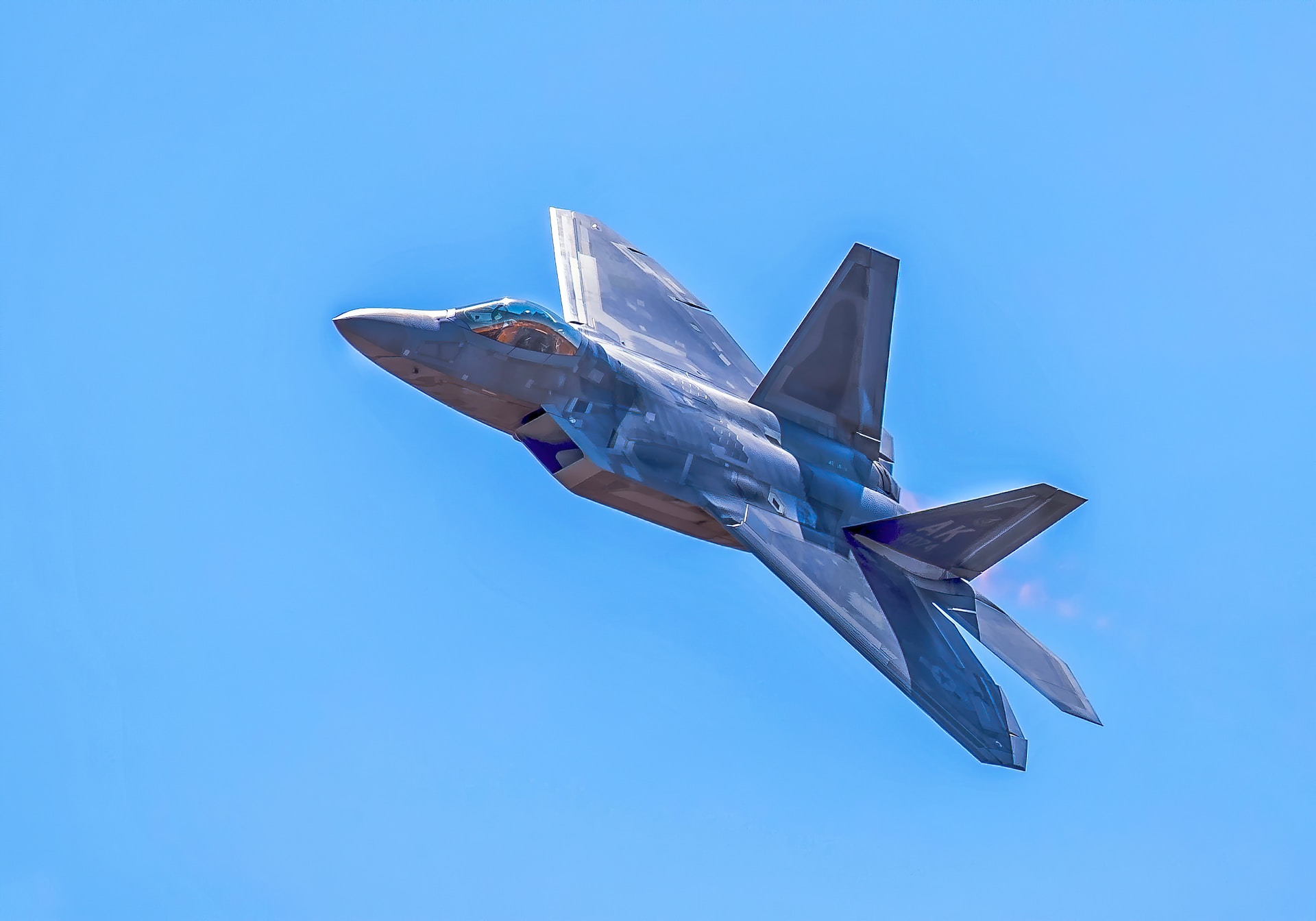 jet flying in clear blue sky