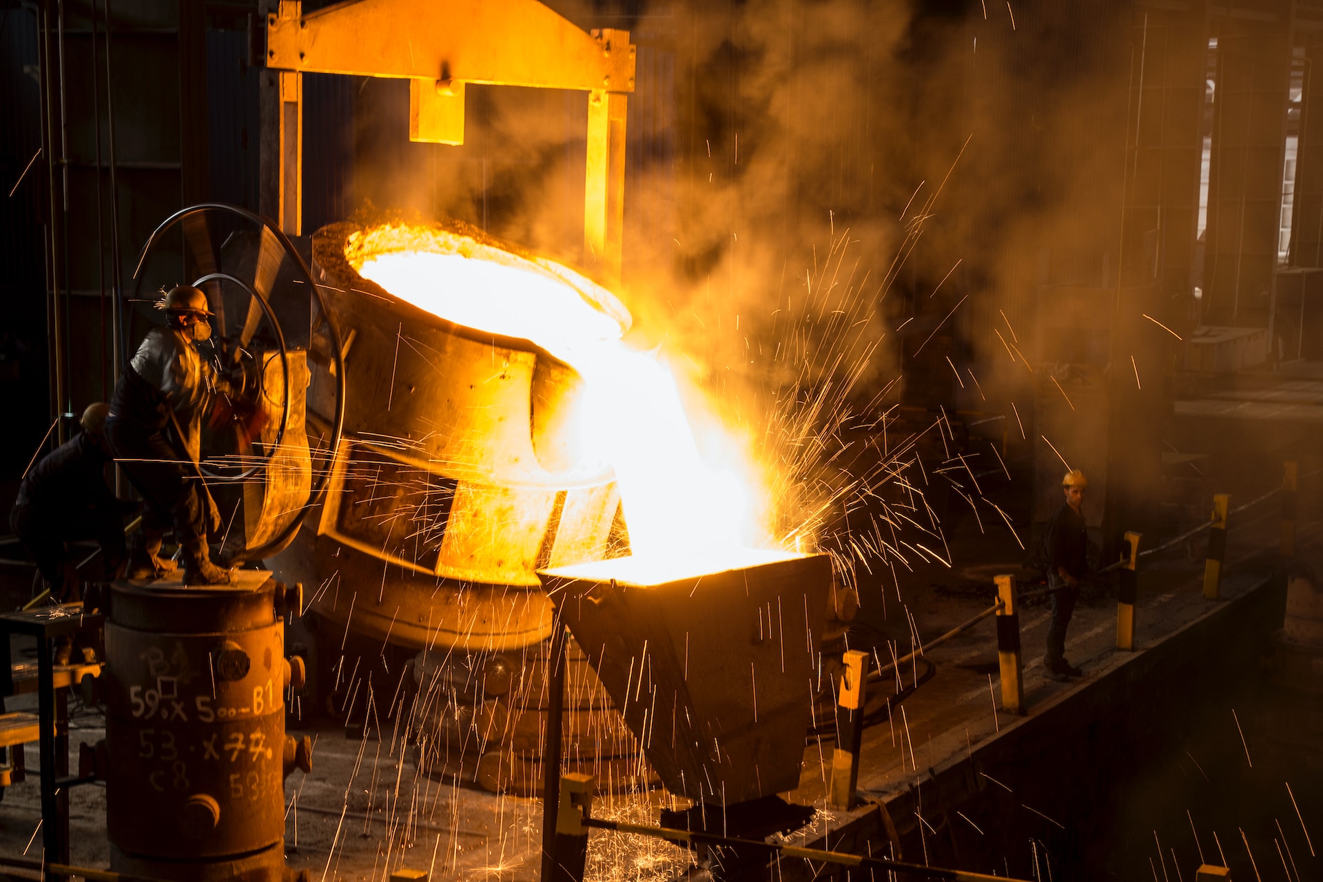 molten material being poured in a manufacturing warehouse